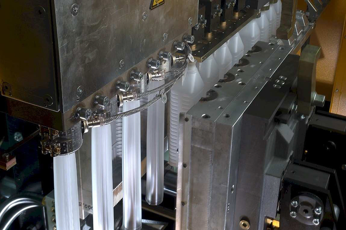 Graham Engineering Corp Form Blown Bottles in Machine